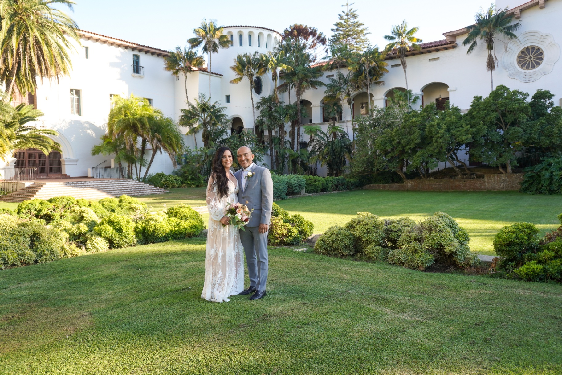 Bride and groom at the historic Santa Barbara Courthouse Sunken Gardens for a Spanish Colonial intimate wedding